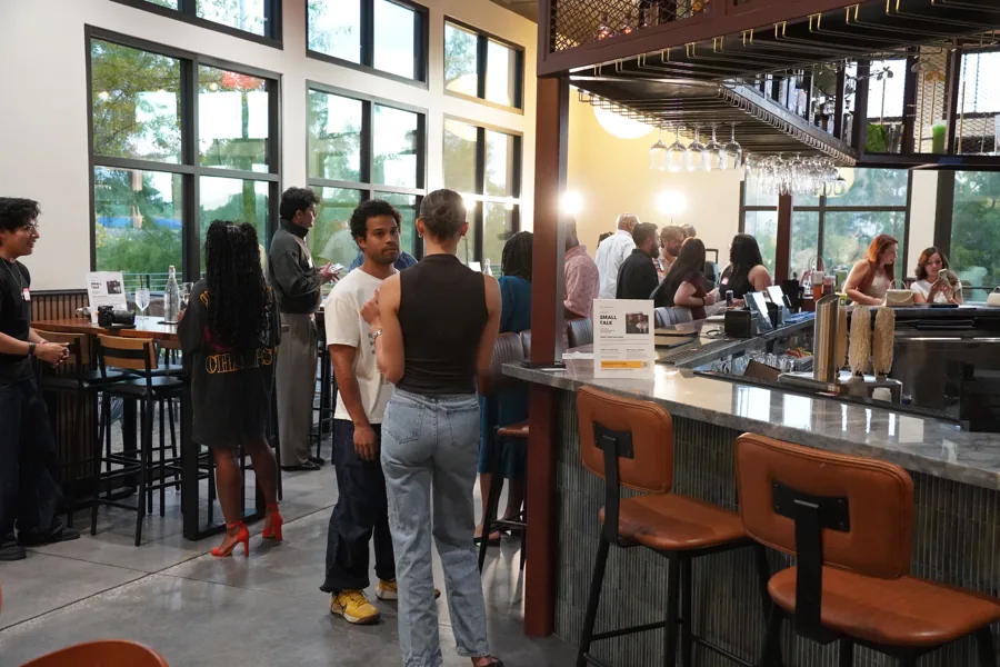 Guests in conversation at Small Talk at City Cellars